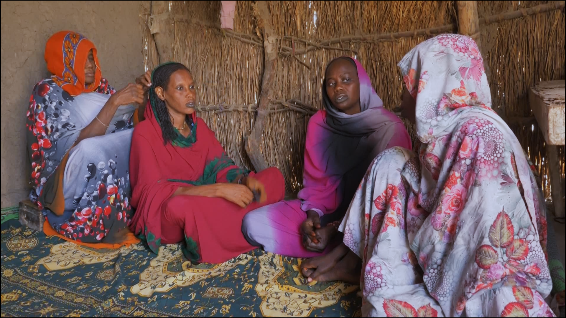 A group of women seated together in conversation