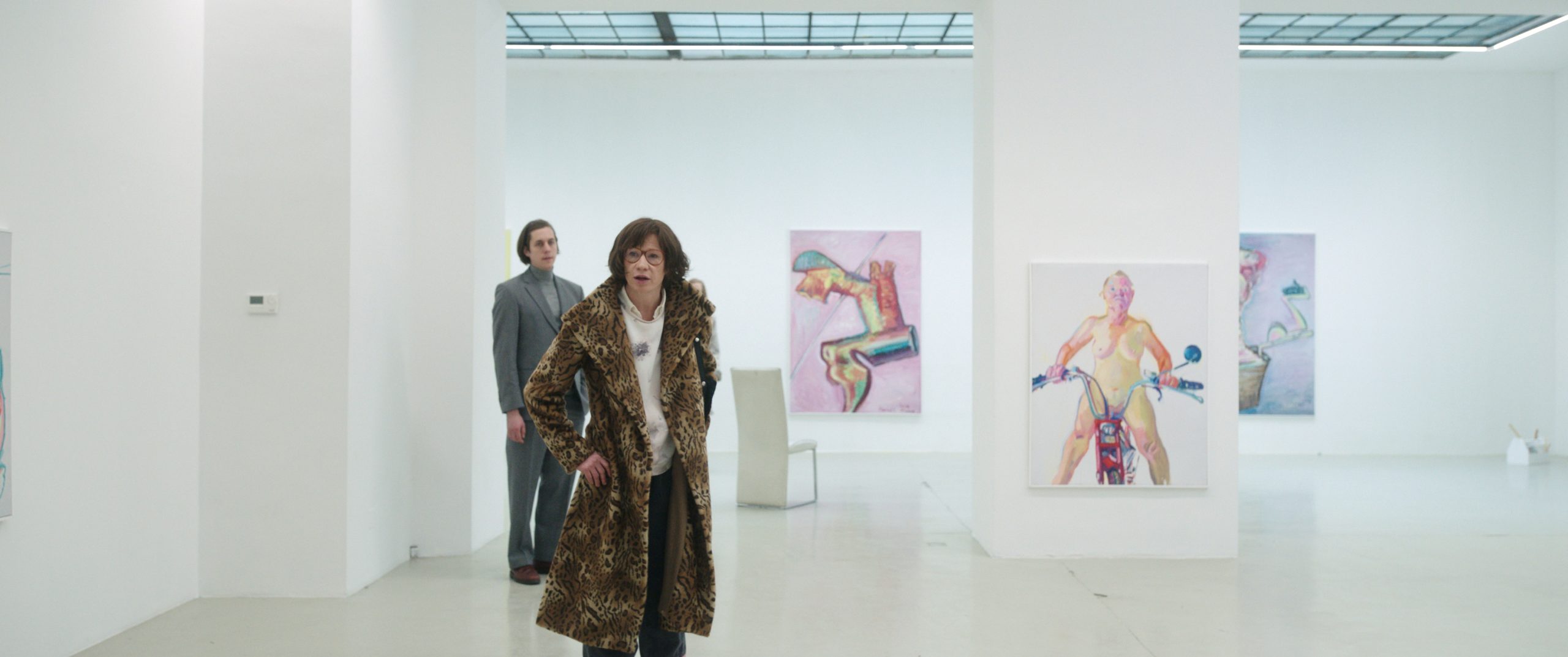 Figures in a gallery space in Sleeping with a Tiger