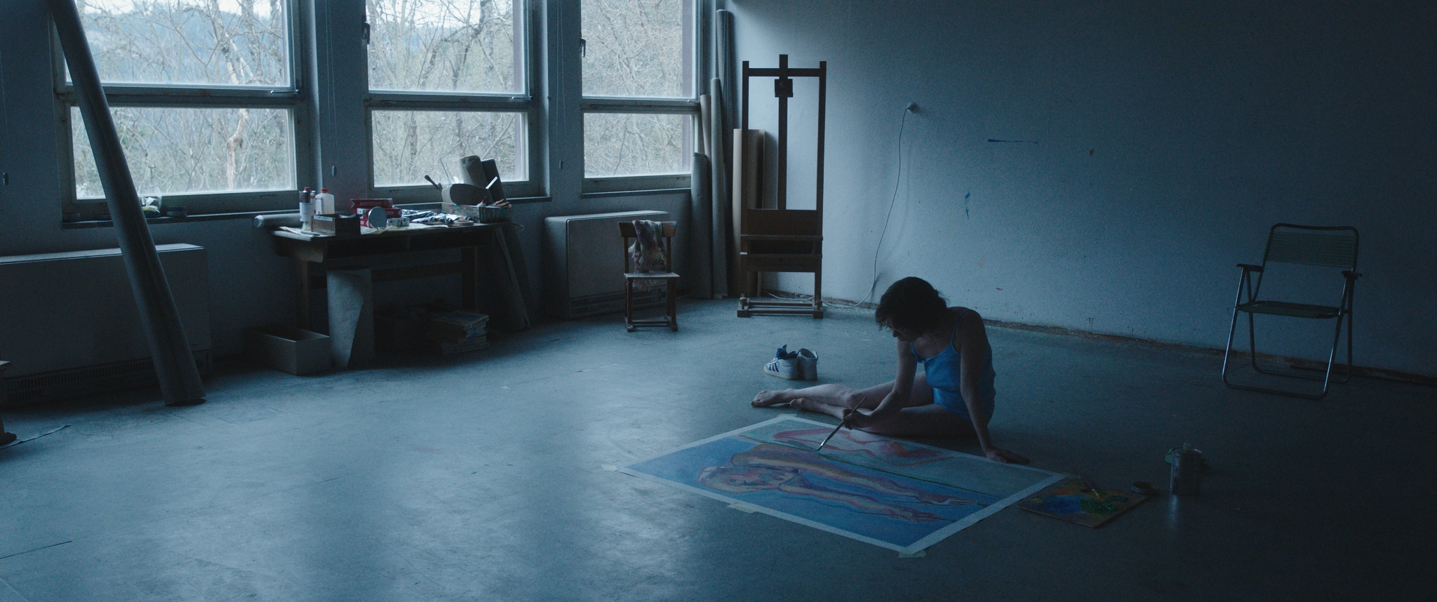 A dark studio scene from Sleeping with a Tiger