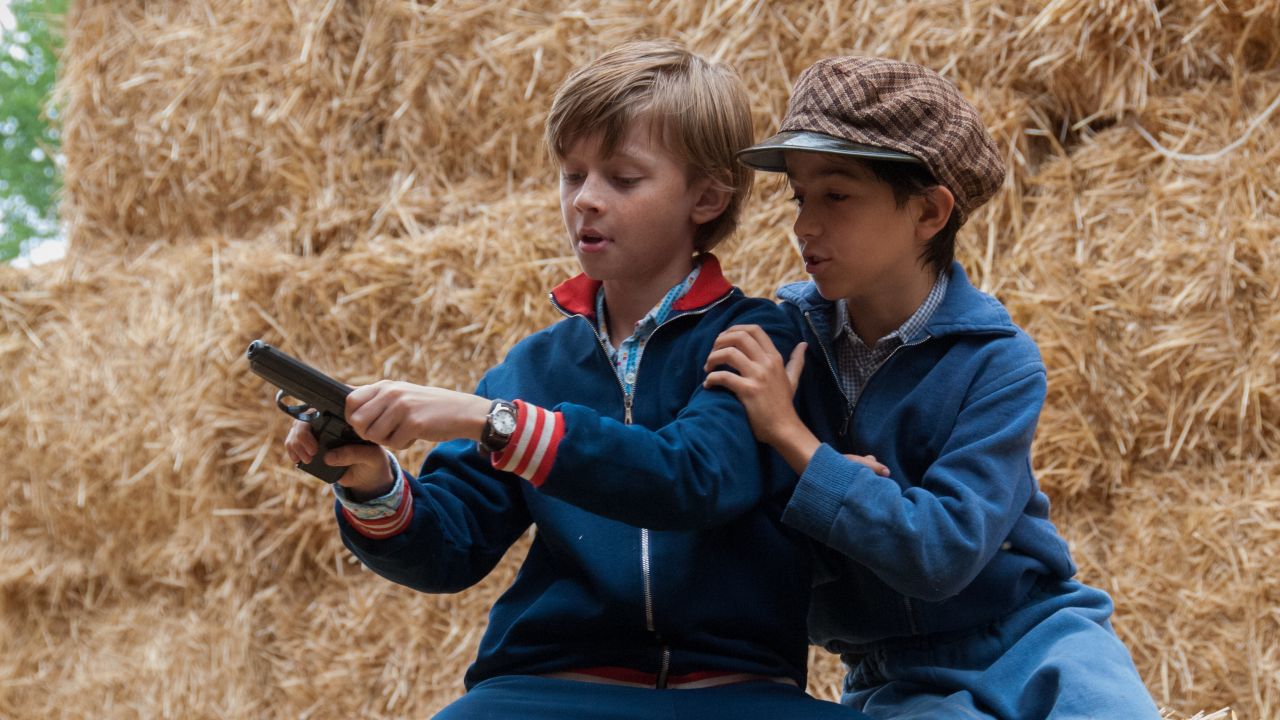 Two young characters in a period scene from The Dormant Account