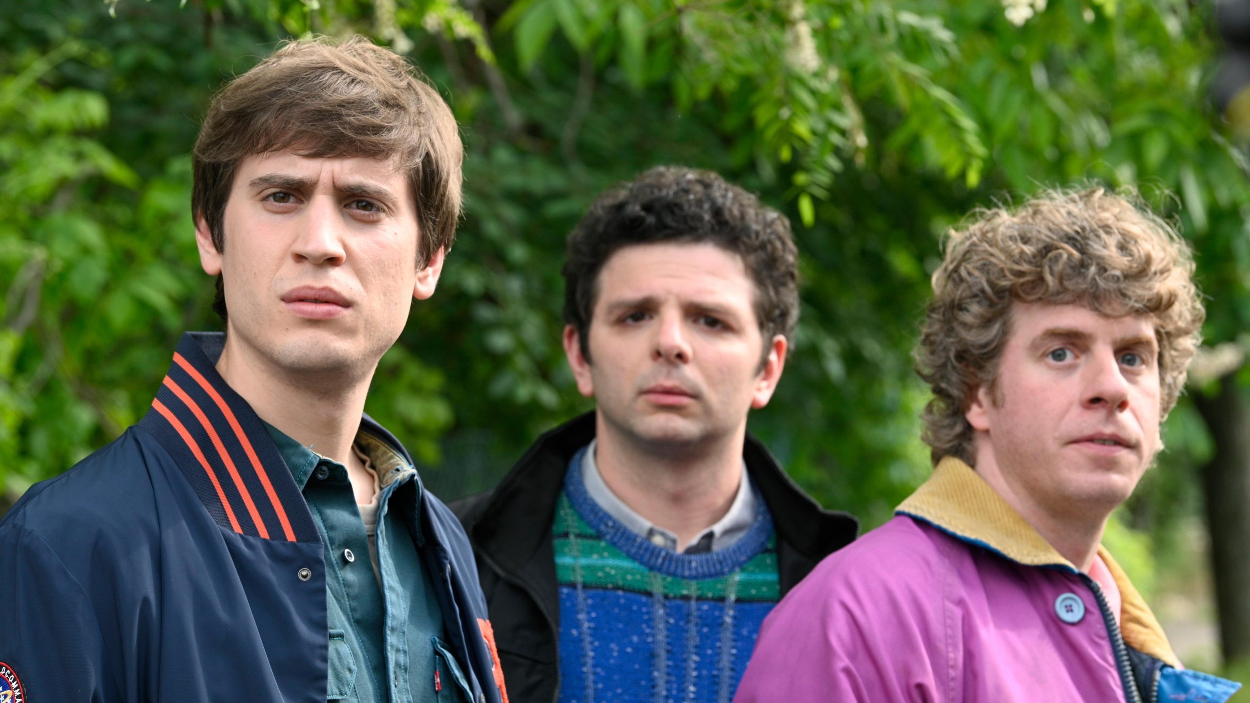 Three young men from Adventures Italian Style Reloaded standing together outdoors