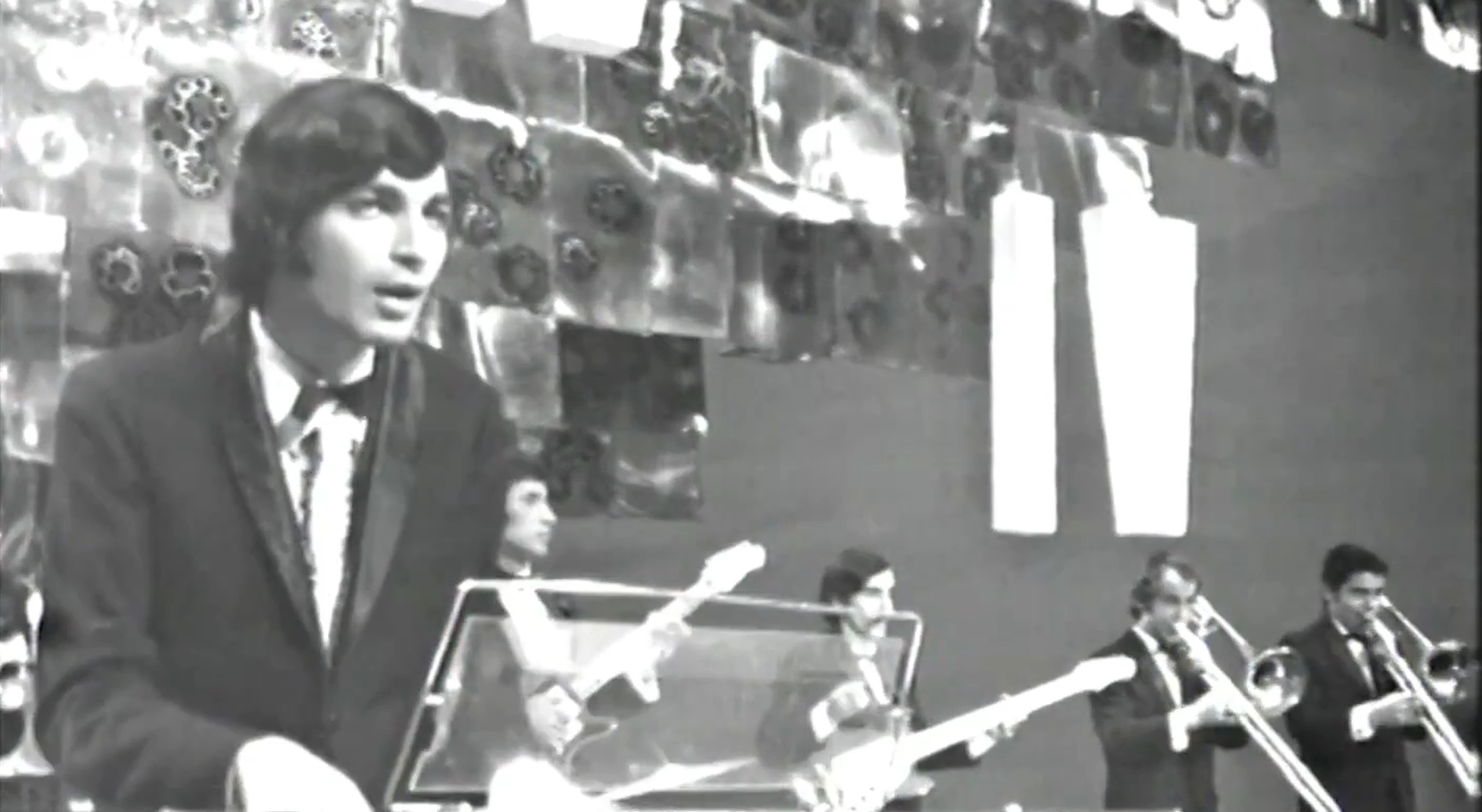 Black-and-white archival footage of Romanian television