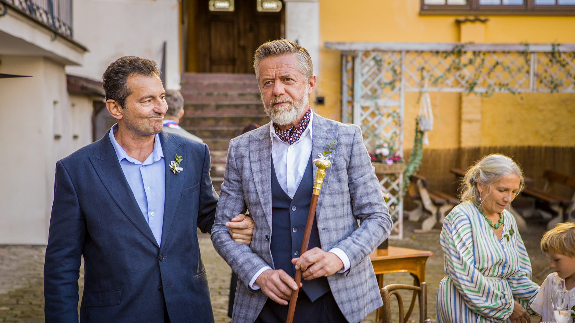 Josef and Václav together at a courtyard gathering